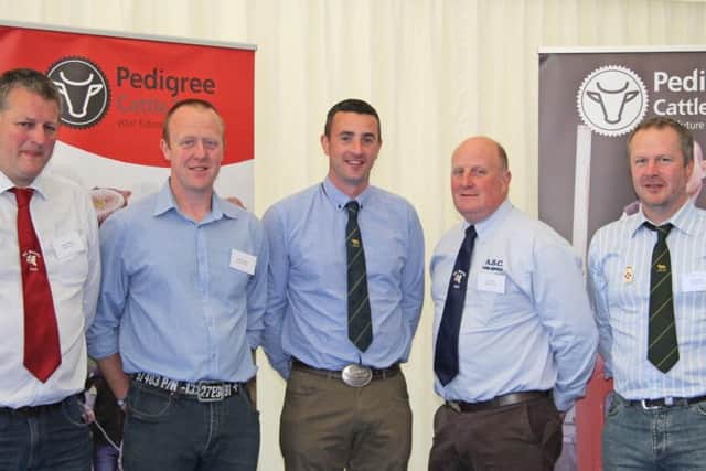 William McElroy, centre, president, British Blonde Society; is pictured at the Pedigree Cattle Trust breakfast with NI Blonde Club members, Roger Johnston, Brian McGartland, Alan Carson, and David Gibson.