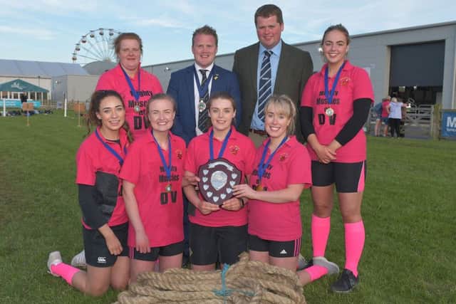 Winners of the 2018 female tug of war competition, Derg Valley YFC, pictured with Philip Donaldson from sponsor John Thompson and Sons Ltd and YFCU president James Speers