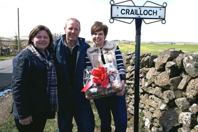 Joy Rollston with Angus and Helen McColm.
