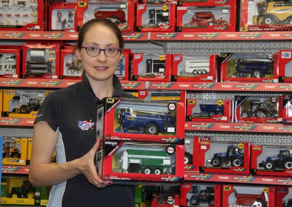 Irwin Farm Supplies boasts an extensive range of toys, and its online shop www.kidsfarmtoys.com offers a next day delivery in NI. Alison Colbert is pictured with a variety of the Britains models available.