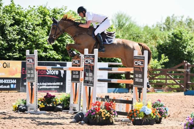 Frank Curran riding Oliver Twister, winners of the 1.35m UR/Ballyward Equestrian Summer Tour
