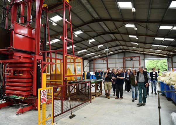 Producers tour the facilities at the new Ashford grading depot