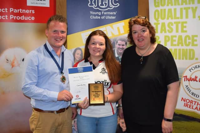 Claire Ramsay, Kilraughts YFC collects first place for in the junior section of the home management final. Claire (centre) is pictured collecting her plaque with YFCU president, James Speers (left) and Paula McIntrye (right)