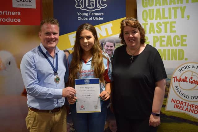 Sarah Spence, Bleary YFC was awarded third place in the junior section of the home management final. Sarah (centre) is pictured with YFCU president, James Speers (left) and Paula McIntyre (right)