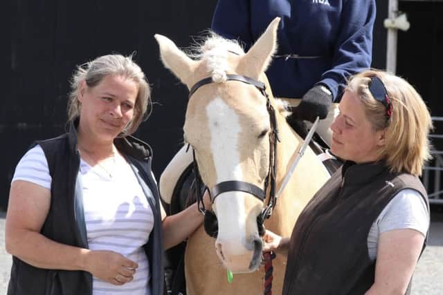 Last year's winning horse Doro with Janine Clarke and Kerry and Fiona