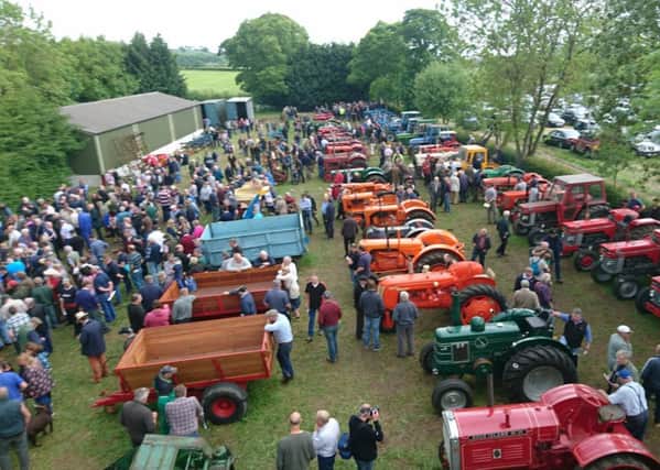 A vintage tractor auction has raised more than Â£300,000 thanks to the expertise of one of the countrys leading rural land specialists