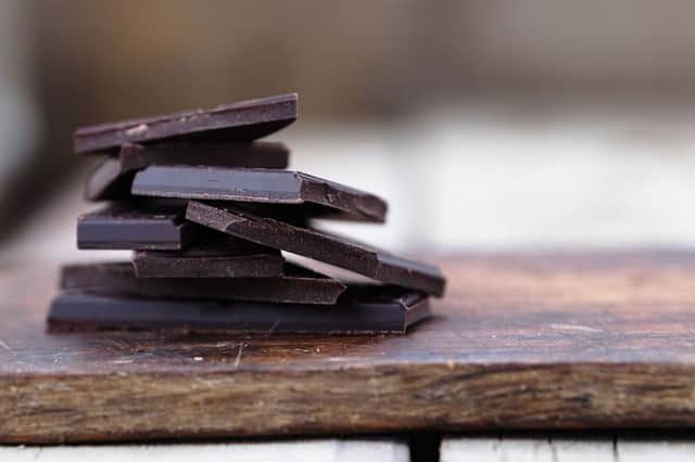 A generic photo of broken dark chocolate on a wooden table. See PA Feature TOPICAL Health Heart. Picture credit should read: PA Photo/thinkstockphotos. WARNING: This picture must only be used to accompany PA Feature TOPICAL Health Heart.