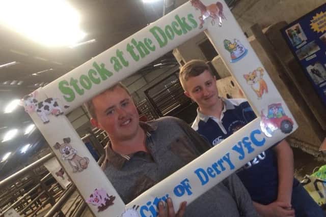 Members Ryan Kelly and Matthew McCorkell helping at the City of Derry YFC stand