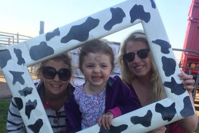 Say cheese: Joanne Killen with four year old daughter Olivia Killen and Wendy Canning