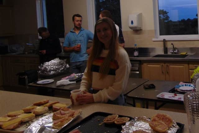Club secretary Reagan Robinson welcoming the guest back from the treasure hunt with a delicious supper