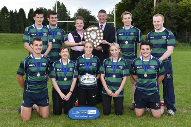 Senior Tag Rugby Winners, Annaclone and Magherally YFC pictured collecting the Adrian Cooper Shield from YFCU President, James Speers and Robert McCullough, Head of Agri Business at Danske Bank.