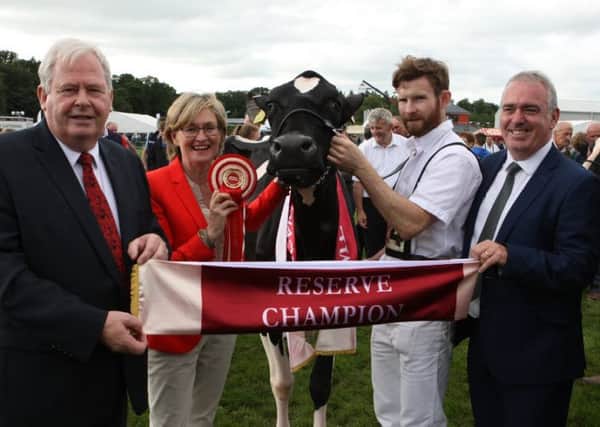 Pictured at the 2018 Diageo Baileys Champion Cow Competition is Thomas Neville son of Donal Neville from Co Limerick who won Reserve Champion at the Virginia Show with his cow Milliedale Dusk Rhapsody. Pictured with him are from left Martin Keane Chairman Glanbia Ireland; Mairead McGuinness, Vice President of the European Parliament; and Robert Murphy Head of Baileys Operations, Diageo Baileys Global Supply.
