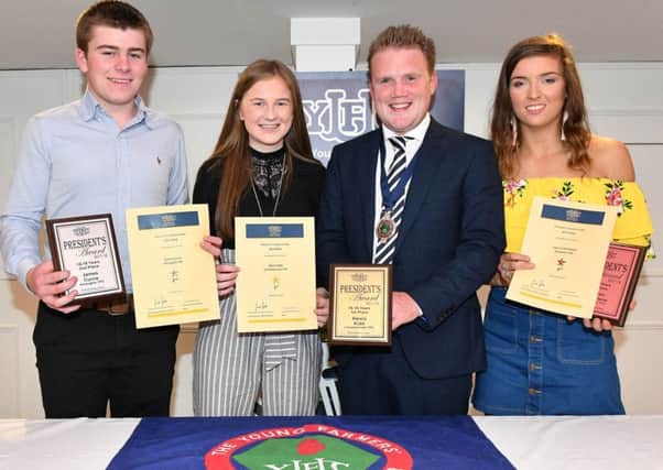 16-18 age category (left to right) James Currie, Kilraughts YFC (second place), Alexis Kidd, Lisnamurrican YFC (first place), James Speers, YFCU president, and Lauren McFarlane, Dungiven YFC (third place)