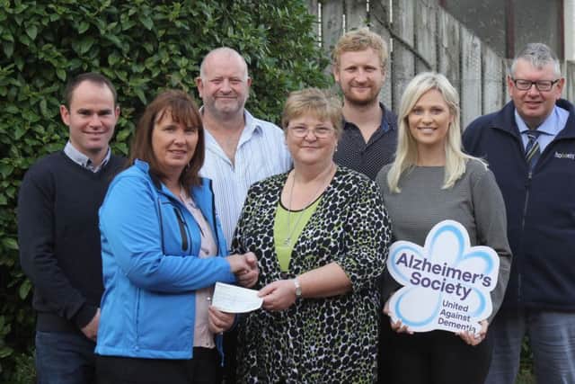 Holstein NI has presented a cheque for £8,500 to the Alzheimer's Society. Community fundraiser Amanda McGale received the cheque from club chairman Jason Booth, club secretary John Martin; and the Irwin Family, Alan, Sylvia, David and Heidi, hosts of the 2018 Open Day. Picture: Julie Hazelton