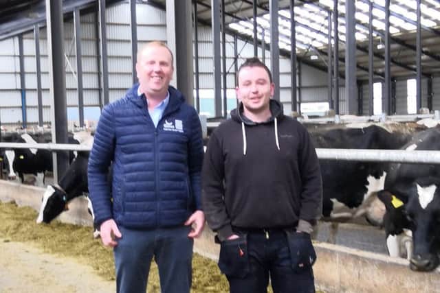 Pauric McKenna, right, herd manager at Greenville Dairies discussing the implementation of their new robot custom indices with Richard Walker, Genus ABS.