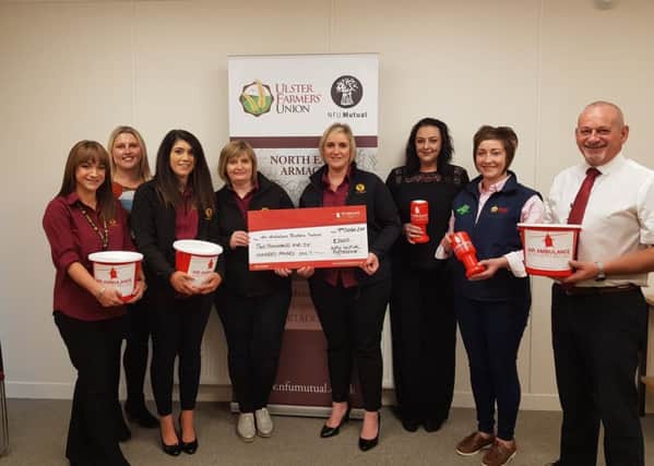 Pictured at the handover of the funds raised by NE Armagh Group for the UFU Centenary Charity are NE Armagh Group Managers Avril Macauley and Lawson Burnett, Roberta Simmons UFU Membership Development Officer and office staff Martina, Kirsty, Sonia, Lee and Kerry.