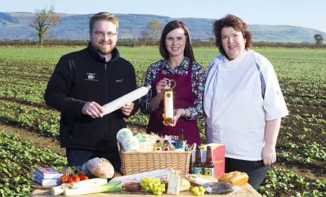 Pictured against the beautiful backdrop of Binevenagh mountain are local producers Alastair Crown from Corndale Farm and Leona Kane from Broighter Gold pictured with local food ambassador Paula McIntyre at the launch of Taste Causeway, a new 9-day culinary celebration which takes place across the Causeway Coast and Glens from November 10th - 18th. PICTURE STEVEN MCAULEY/MCAULEY MULTIMEDIA