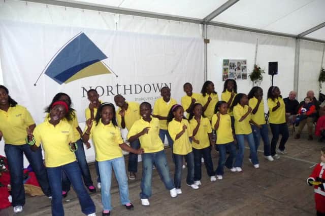North Down Marquees celebrates it's 10th.Anniversary of being the 
Major Sponsor of The Saintfield Christmas Charity Ride. They supplied 
a marquee for the arrival of the Ugandan Orphans (Mwamba 
Choir) in 2009 and have remained the major Sponsor ever since. 
The Mwamba Choir set Saintfield alight with their singing and dancing 
when they arrived in 2009.