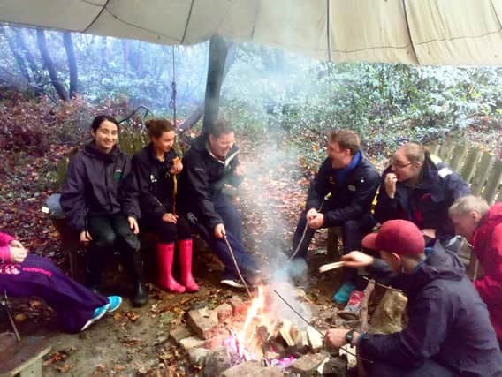 YFCU president James Speers, YFCU deputy president Zita Blair, Ulster Wildlife Project officer and YFCU member enjoy team bonding and chat by the campfire