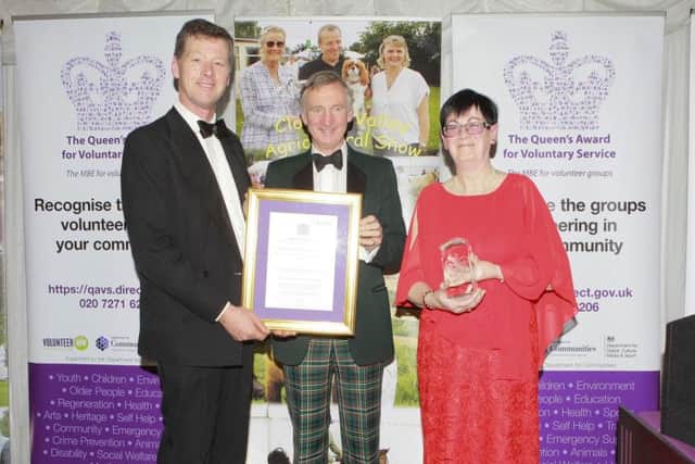 Nicholas Lowry (Chair) and Ruth Montgomery BEM (Secretary) of the Clogher Valley Agriculture Society receives the Queens Award for Voluntary Service from the Lord Lieutenant of Tyrone Robert Scott OBE on behalf of the Society at their Gala Ball celebrating their 100th show in the Valley Hotel, Fivemiletown