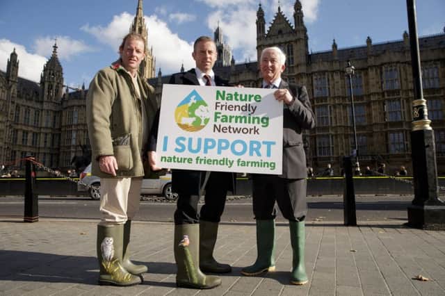 Northern Ireland farmers Philip Bell (middle) and John Carson (right) at Westminster