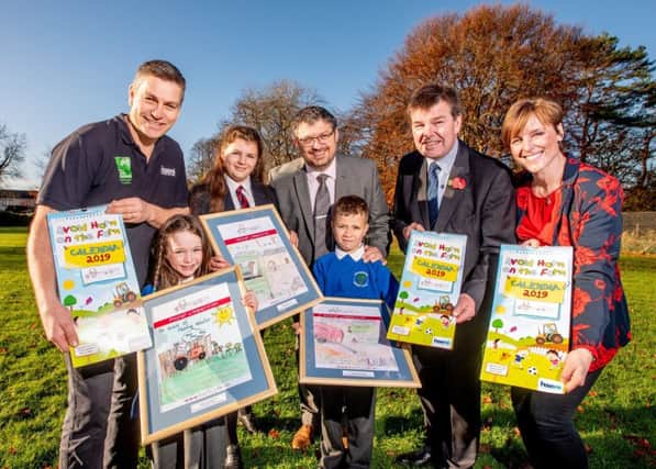 At the launch of the Avoid Harm on the Farm child safety 2019 calendar at Broughshane Primary School, Co Antrim are (l-r) David Lowe, HSENI Inspector, Sofia Steel, Broughshane PS, Poppy Millar, ex-pupil Broughshane PS, Mr Richard Topping, Principal Broughshane PS, Kallum Kinnear, Broughshane PS, Derek Martin, Chairman HSENI, and Mrs Tricia Patterson, Broughshane PS. See story on page 3