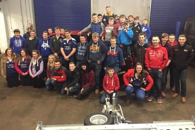Members in Eakin Brothers Garage, Claudy