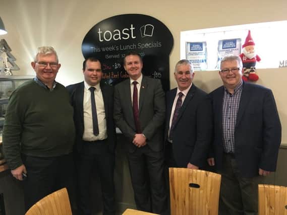 Ivan Johnston pictured with Richard Primrose and Jonathan Reilly, from Bank of Ireland; Deputy UFU president
Victor Chesnutt, and Robert McMullan