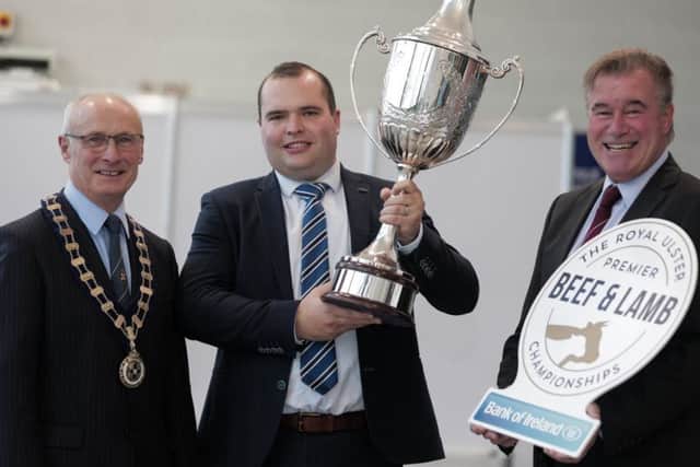 RUAS President Cyril Millar, Richard Primrose Agri Manager for Bank of Ireland UK, and RUAS Chief Executive Alan Crowe pictured with the renowned Allams Cup ahead of the first Royal Ulster Premier Beef & Lamb Championships.