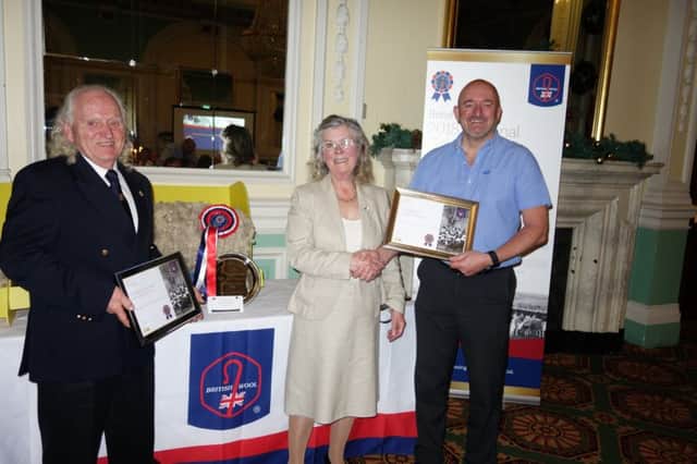 From left to right, Mr Robin McEwen-King, Mrs Margaret McEwen-King (Golden Fleece Champions 2018) and Stephen Spencer (Wool Sales Technical & Quality Manager at British Wool) with the champion Shetland fleece.