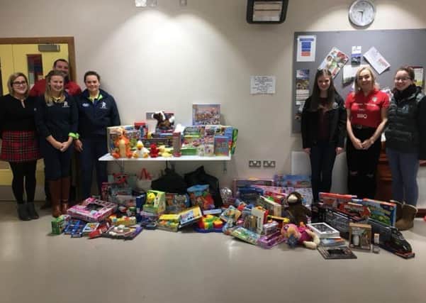 Co Antrim Young Farmers Clubs donating toys for Cash 4 Kids Mission Christmas Appeal