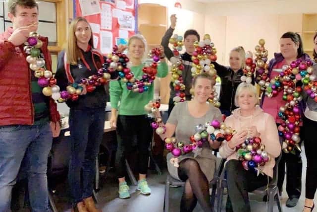 Co Down Young Farmers Clubs collect unwanted Christmas decorations to spread Christmas cheer in Ulster Hospital wards