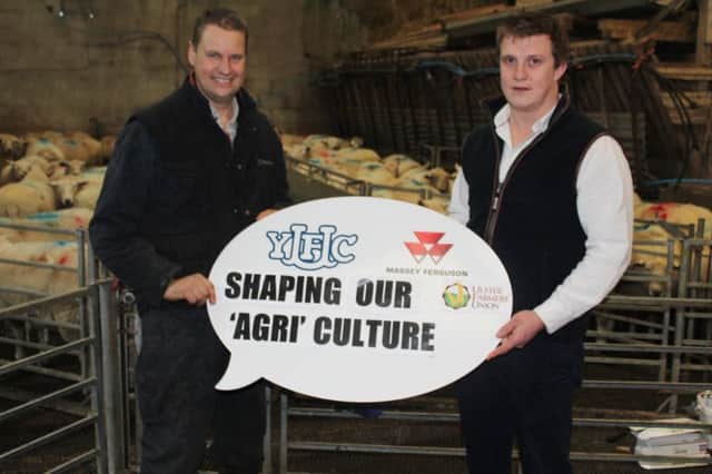 Greyabbey sheep producer John Martin (left) discussing the upcoming farm visit that will be an integral part of the 3rd YFCU agriculture 
conference with James Purcell, chair of the YFCU agriculture and rural 
affairs committee.