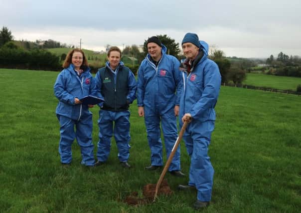 Ruth Moore, Beef and Sheep Development Adviser CAFRE with Business Development Group host Brendan Gallagher, group member Ian Brown and Bryan Irvine from the Sustainable Land Management Branch preparing to discuss soil fertility and soil nutrient management in Springfield, Co Fermanagh