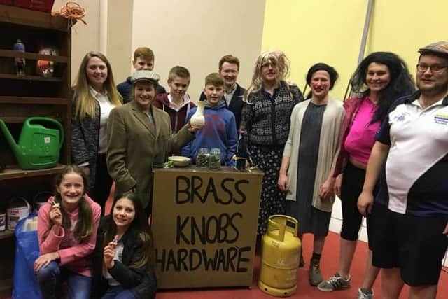 The cast of Brass Knobs