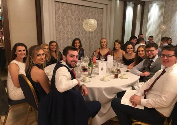 A table of Lisnamurrican YFC members ready for the four course meal at The Dunadry Hotel