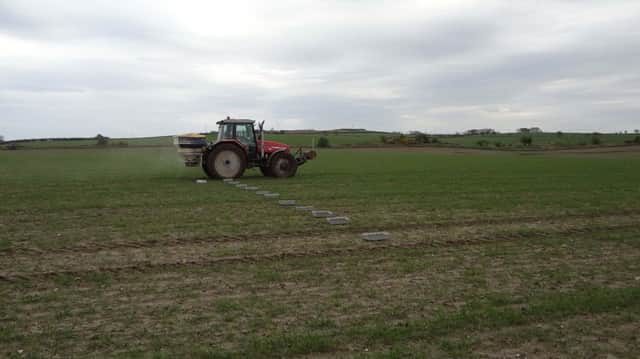Using a field tray test to check calibration in a fertiliser sower.