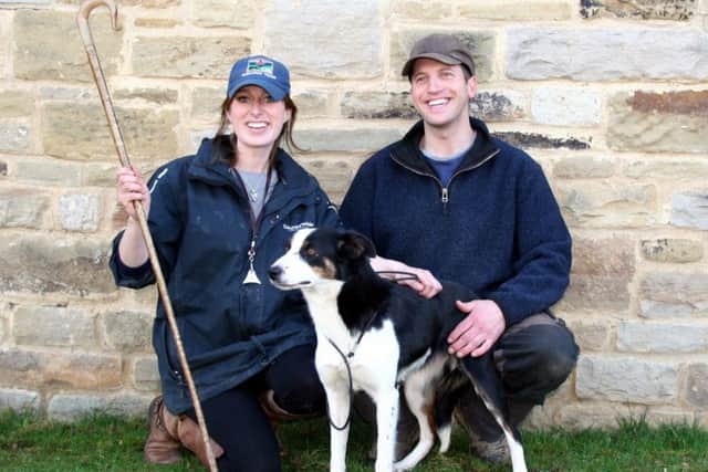 Emma Gray with her 14,000gns world record price sheep dog bitch Brenna, joined by husband Ewan Irvine