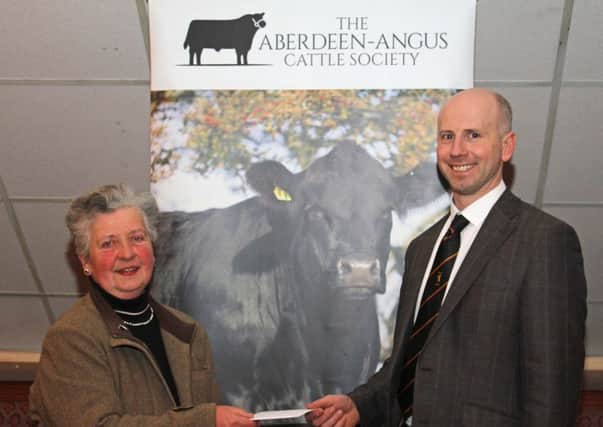 Guest speaker Dr Cahir McAuley BVMS MRCVS receives a token of appreciation from NI Aberdeen Angus Club secretary Cathy O'Hara. Picture: Julie Hazelton