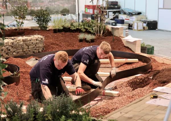Shea McFerran, CAFRE (right) and Sam Taylor of Myerscough College in England team working moulding landscape edging at the Euroskills competition in Budapest 2018