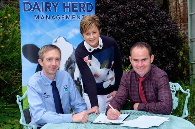 Discussing the agenda for Holstein NI's 20th AGM on Monday 8th April are, from left: Gary Watson, producer services manager, Dale Farm, sponsor; Julie Wallace, PR and events co-ordinator, Holstein NI; and Jason Booth, chairman, Holstein NI. Photograph: Columba O'Hare/ Newry.ie