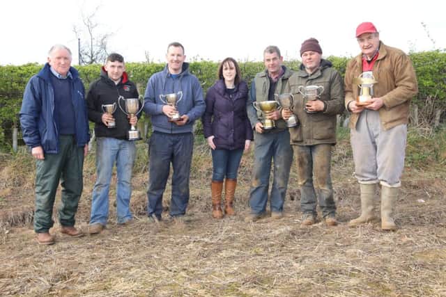 Prize winners: Nevin Smith, Declan Ferris, Paul Graham, Christine Wilson, David Grattan, James Adair, and Raymond Clifford.