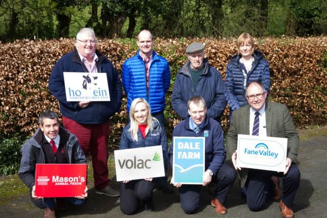 Launching Holstein NI's charity open day, are princpal sponsors, front row, from left: Colin Pudy, Mason's Animal Feeds; Rebecca O'Sullivan, Volac; Neville Graham, Dale Farm; and Dessie Ferguson, Fane Valley. Back row, from left: Charlie Weir, vice-chairman, Holstein NI; and hosts, George, Hans and Valerie Mitchell, Edenordinary Herd, Banbridge. Picture: Devennie Photography