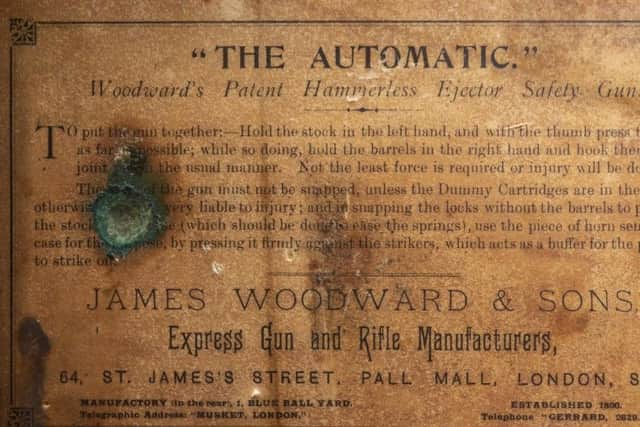 Original information on the case containing Churchill's pair of Woodward shotguns which have gone on public display for the first time at Blenheim Palace