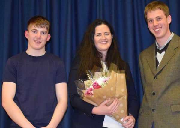 Club secretary Lewis Gregg and club leader Michael Torrens thanking Claire Sugden MLA for coming along to the annual parents night