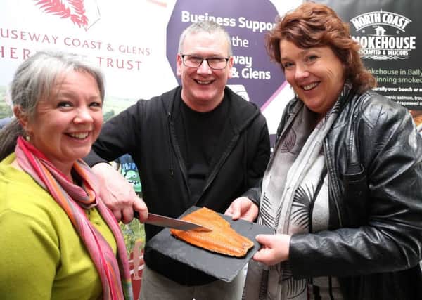 Ruari and mealine Morriosn with chief guest Paula McIntyre at the launch of North Coast Smokehouse Économusée, Ballycastle. PICTURE KEVIN MCAULEY/MCAULEY MULTIMEDIA