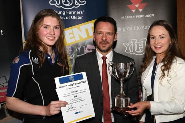 (Left to right) Junior Ulster Young Farmer Anna Boyd from Straid YFC with Hugh Doherty from Danske Bank, and YFCU president Zita McNaugher