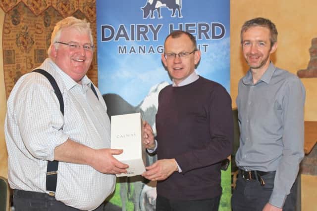 CAFRE adviser Alan Hopps was the guest speaker at Holstein NI's 20th AGM, held in Ballinderry. He received a token of appreciation from newly elected chairman Charlie Weir, and sponsor Gary Watson, Dairy Herd Management. Picture: Julie Hazelton