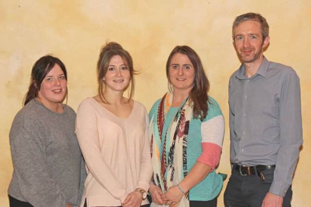 HYB officials, from left: Heather Martin, secretary; Jess Hall, treasurer; and Leiza Montgomery, co-ordinator, pictured with Gary Watson, Dairy Herd Management, sponsor of Holstein NI's 20th AGM. Picture: Julie Hazelton