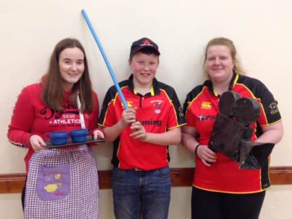 Pictured are Derg Valley YFC members, from left, Hannah Hemphill, Josh Hamilton and Lauren Moore, who are getting in character for their club's performance.